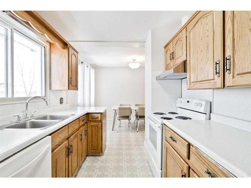 11 Westview Drive Sw, Calgary, AB - Indoor Photo Showing Kitchen With Double Sink