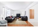 11 Westview Drive Sw, Calgary, AB  - Indoor Photo Showing Living Room 