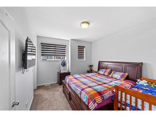 315 Saddlecreek Point Ne, Calgary, AB - Indoor Photo Showing Bedroom