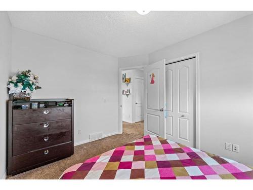 315 Saddlecreek Point Ne, Calgary, AB - Indoor Photo Showing Bedroom