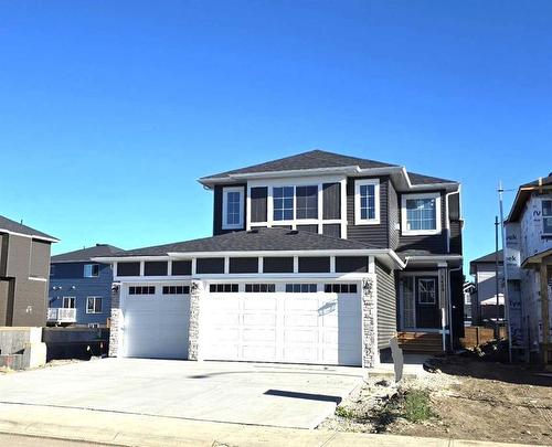 1439 Scarlett Ranch Boulevard, Carstairs, AB - Outdoor With Facade