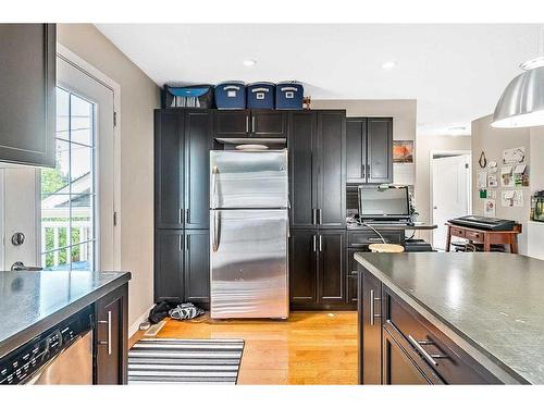 216 Windsor Avenue Nw, Diamond Valley, AB - Indoor Photo Showing Kitchen With Stainless Steel Kitchen