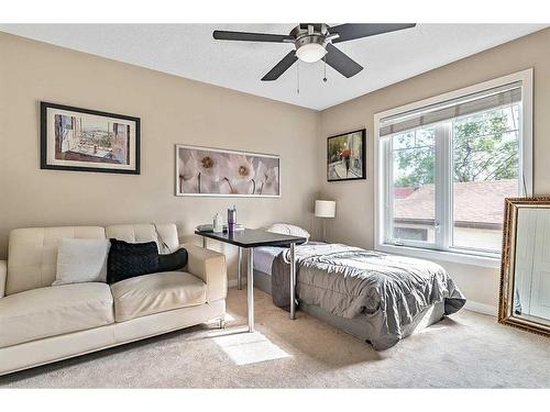 216 Windsor Avenue Nw, Diamond Valley, AB - Indoor Photo Showing Bedroom