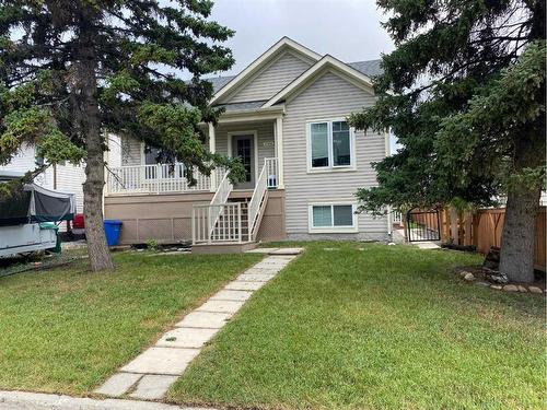 216 Windsor Avenue Nw, Diamond Valley, AB - Outdoor With Deck Patio Veranda