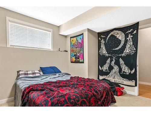 216 Windsor Avenue Nw, Diamond Valley, AB - Indoor Photo Showing Bedroom