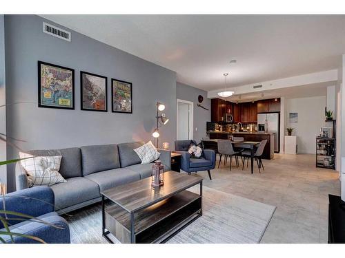 2103-210 15 Avenue Se, Calgary, AB - Indoor Photo Showing Living Room