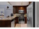 2103-210 15 Avenue Se, Calgary, AB  - Indoor Photo Showing Kitchen With Stainless Steel Kitchen With Double Sink 