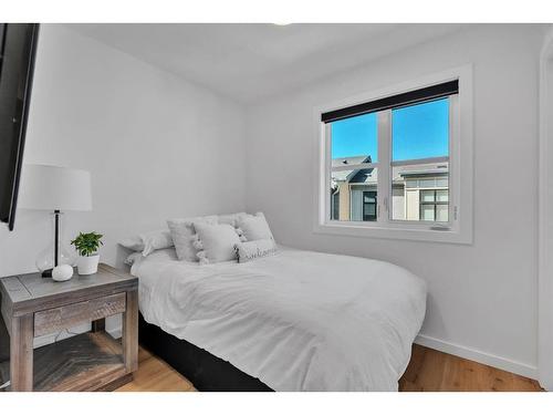 83 Spring Willow Close Sw, Calgary, AB - Indoor Photo Showing Bedroom