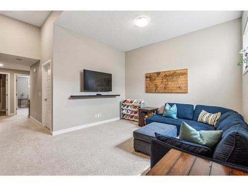 295 Masters Row Se, Calgary, AB - Indoor Photo Showing Living Room