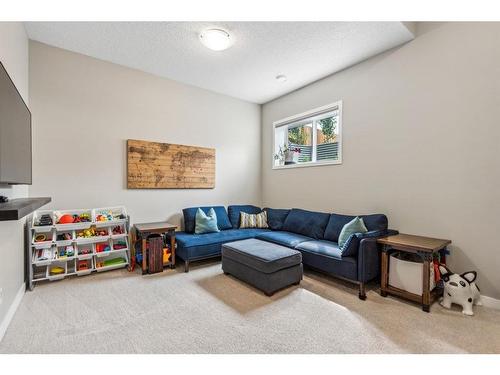 295 Masters Row Se, Calgary, AB - Indoor Photo Showing Living Room