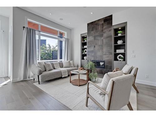 1660 42 Street Sw, Calgary, AB - Indoor Photo Showing Living Room With Fireplace