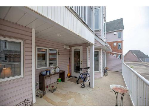 1102-1000 Hawksbrow Point Nw, Calgary, AB - Outdoor With Deck Patio Veranda With Exterior