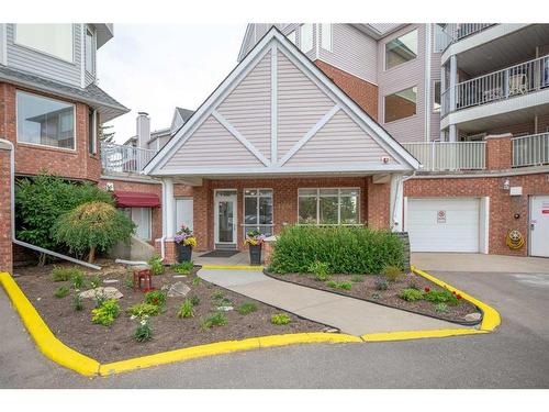 1102-1000 Hawksbrow Point Nw, Calgary, AB - Outdoor With Facade