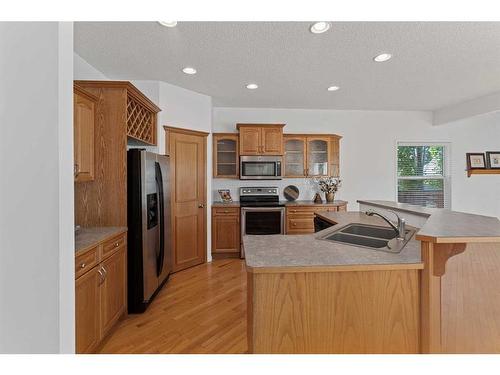 174 Prestwick Estate Way Se, Calgary, AB - Indoor Photo Showing Kitchen With Double Sink