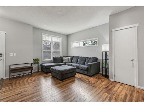 4-300 Evanscreek Court Nw, Calgary, AB - Indoor Photo Showing Living Room