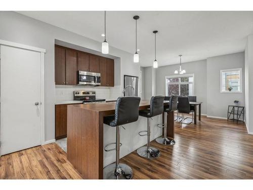 4-300 Evanscreek Court Nw, Calgary, AB - Indoor Photo Showing Kitchen With Upgraded Kitchen