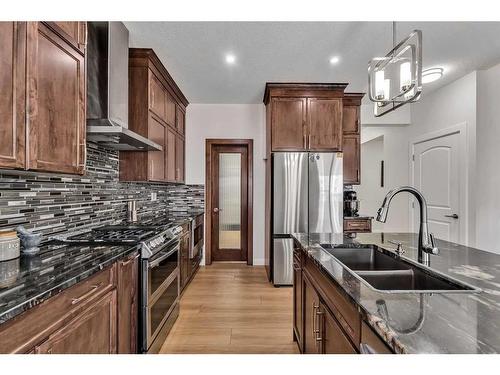 224 Dawson Harbour Heights, Chestermere, AB - Indoor Photo Showing Kitchen With Double Sink With Upgraded Kitchen