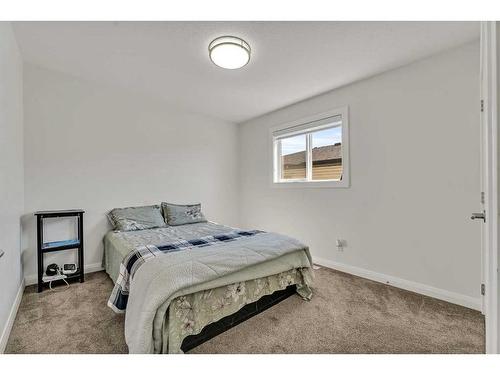 224 Dawson Harbour Heights, Chestermere, AB - Indoor Photo Showing Bedroom