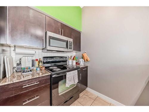 301-8710 Horton Road Sw, Calgary, AB - Indoor Photo Showing Kitchen