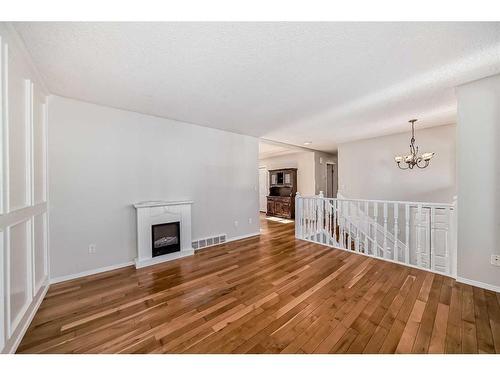 27 Barner Avenue, Red Deer, AB - Indoor Photo Showing Other Room With Fireplace