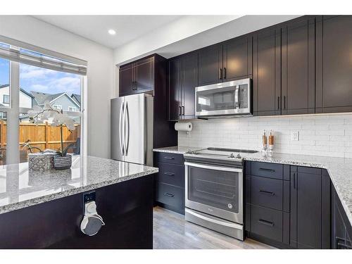 857 Mahogany Boulevard Se, Calgary, AB - Indoor Photo Showing Kitchen With Upgraded Kitchen