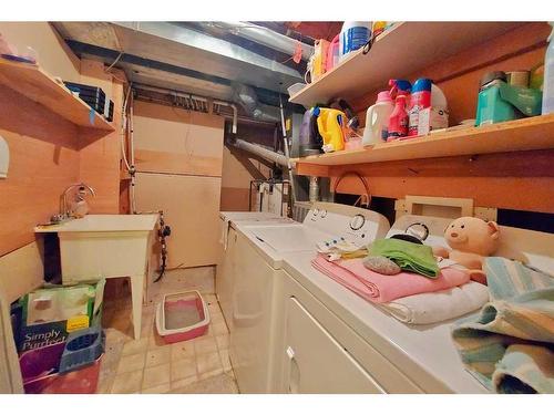 307 Appleglen Place Se, Calgary, AB - Indoor Photo Showing Laundry Room