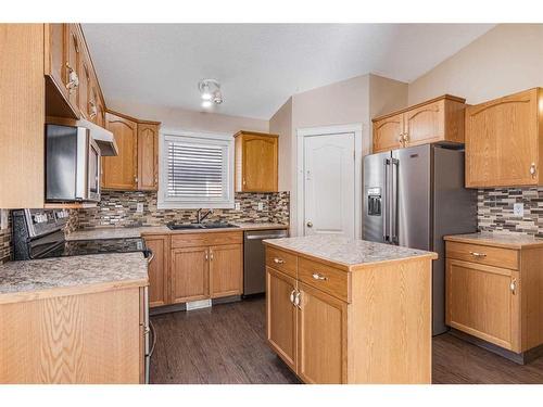 6 Halsall Street, Sylvan Lake, AB - Indoor Photo Showing Kitchen With Double Sink