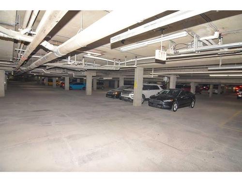 211-270 Shawville Way Se, Calgary, AB - Indoor Photo Showing Garage