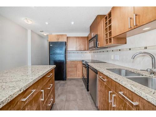 1803-77 Spruce Place Sw, Calgary, AB - Indoor Photo Showing Kitchen With Double Sink