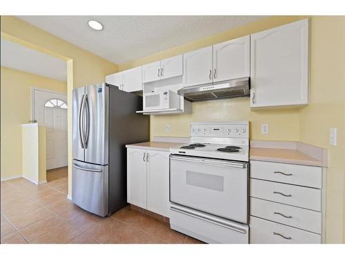 100-388 Sandarac Drive Nw, Calgary, AB - Indoor Photo Showing Kitchen