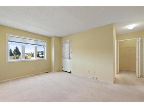 100-388 Sandarac Drive Nw, Calgary, AB - Indoor Photo Showing Other Room