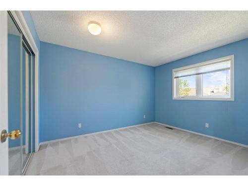 100-388 Sandarac Drive Nw, Calgary, AB - Indoor Photo Showing Other Room