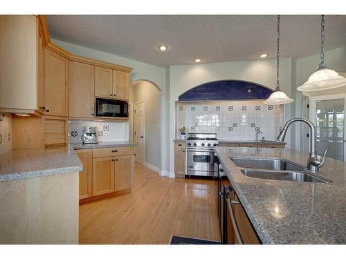 242132 88 Street East, Rural Foothills County, AB - Indoor Photo Showing Kitchen With Double Sink