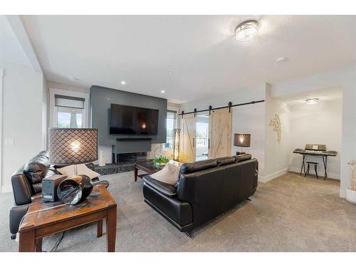 468 Muirfield Crescent, Lyalta, AB - Indoor Photo Showing Living Room With Fireplace