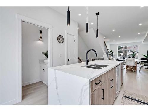 5-3404 8 Avenue Sw, Calgary, AB - Indoor Photo Showing Kitchen With Double Sink With Upgraded Kitchen