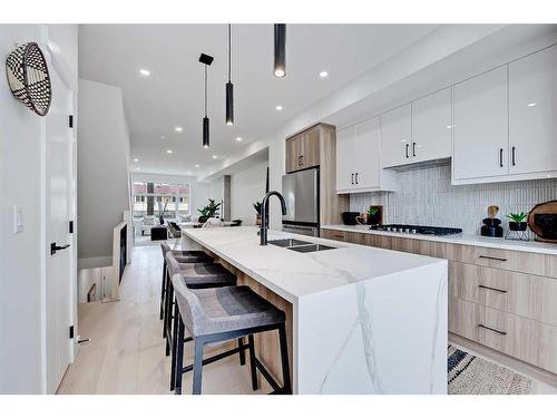 5-3404 8 Avenue Sw, Calgary, AB - Indoor Photo Showing Kitchen With Double Sink With Upgraded Kitchen