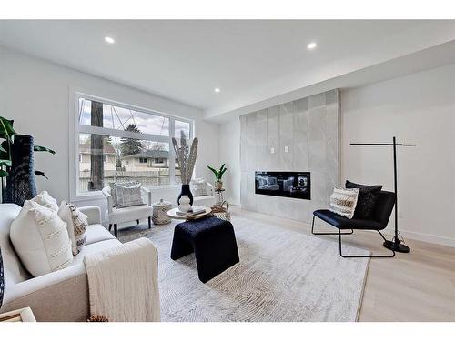 8-3404 8 Avenue Sw, Calgary, AB - Indoor Photo Showing Living Room With Fireplace