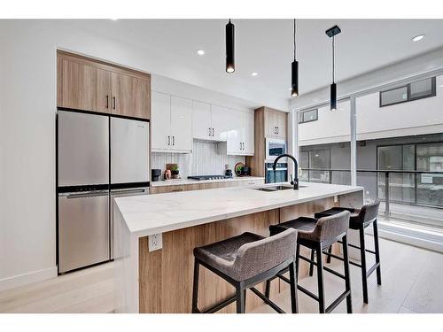 8-3404 8 Avenue Sw, Calgary, AB - Indoor Photo Showing Kitchen With Double Sink With Upgraded Kitchen