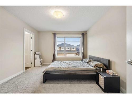 18 Redstone Mews Ne, Calgary, AB - Indoor Photo Showing Bedroom