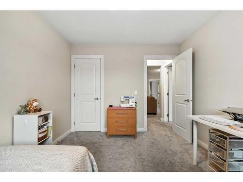 18 Redstone Mews Ne, Calgary, AB - Indoor Photo Showing Bedroom