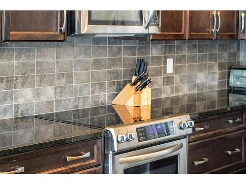 18 Redstone Mews Ne, Calgary, AB - Indoor Photo Showing Kitchen