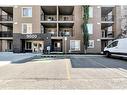 9110-403 Mackenzie Way Sw, Airdrie, AB  - Outdoor With Facade 