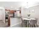 9110-403 Mackenzie Way Sw, Airdrie, AB  - Indoor 