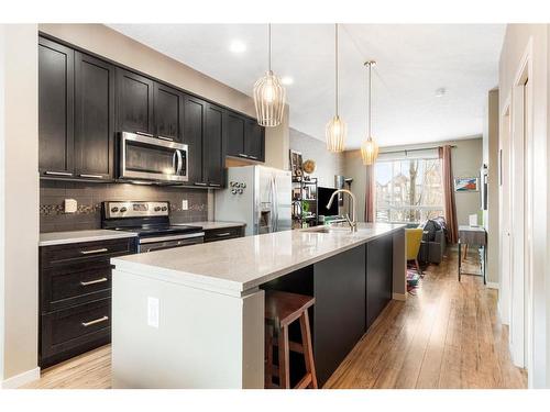 127 Copperpond Row Se, Calgary, AB - Indoor Photo Showing Kitchen With Stainless Steel Kitchen With Upgraded Kitchen