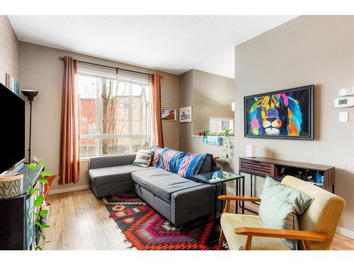 127 Copperpond Row Se, Calgary, AB - Indoor Photo Showing Living Room