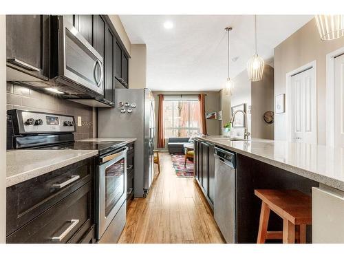 127 Copperpond Row Se, Calgary, AB - Indoor Photo Showing Kitchen With Stainless Steel Kitchen With Upgraded Kitchen