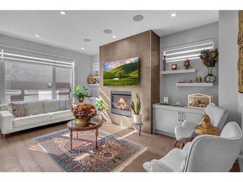 4624 Voyageur Drive Nw, Calgary, AB - Indoor Photo Showing Living Room With Fireplace