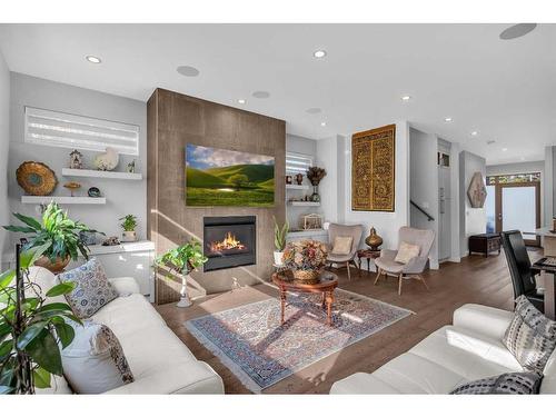 4624 Voyageur Drive Nw, Calgary, AB - Indoor Photo Showing Living Room With Fireplace