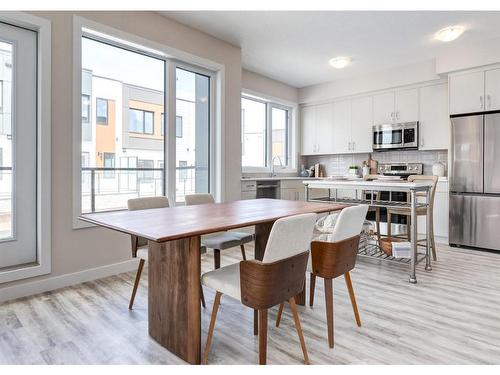 106-1453 Na'A Drive Sw, Calgary, AB - Indoor Photo Showing Dining Room