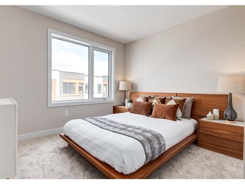 106-1453 Na'A Drive Sw, Calgary, AB - Indoor Photo Showing Bedroom